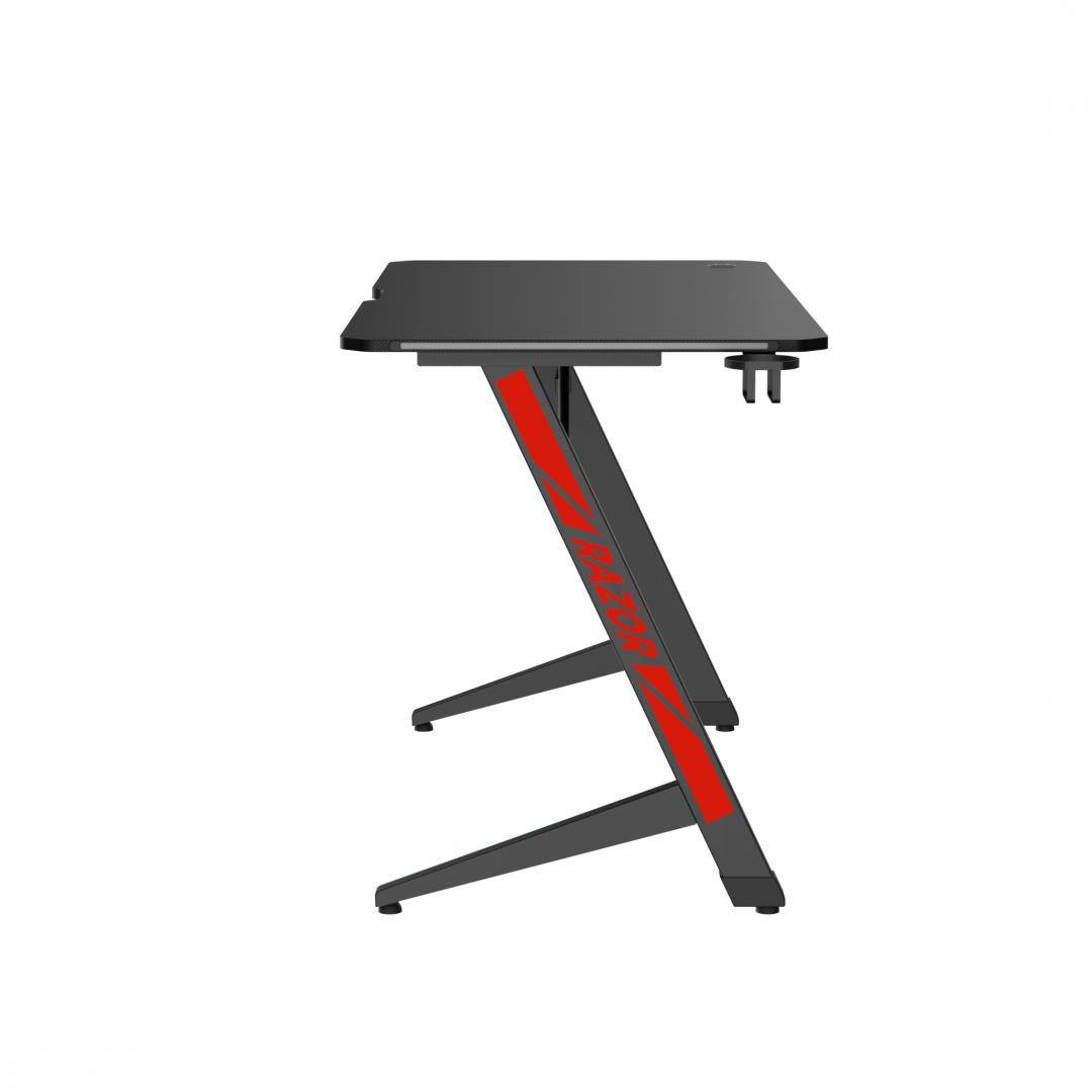 BIROU GAMING SERIOUX RAZOR Material: MDF și melamină, plastic, oțel Dimensiuni 1200x600x750mm Dimensiuni blat (LxlxA) 1200x600x15mm Greutate suportata 75kg Iluminare ambientală LED cu gradient multicolor Culoare: Negru și negru mat, negru și roșu mat