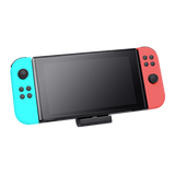 Pachet accesorii Trust pentru conosola Nintendo Switch, pachetul contine: husa de transport, 2 x prinderi Joy-Con, 2 x volan, sticla securizata pentru Switch, sticla securizata pentru Switch OLED, stand de incarcare, cablu USB-C-A, manual de utilizator